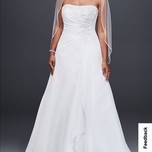 Beautiful white a-line plus size wedding dress. Size 16W. Preserved in the box